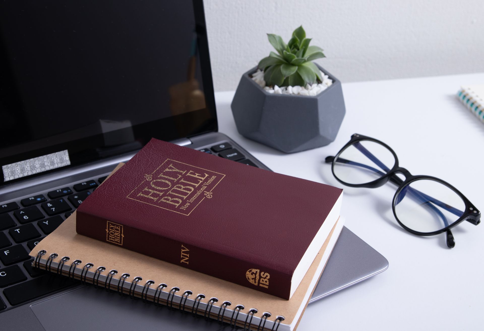 Image of bible on a laptop
