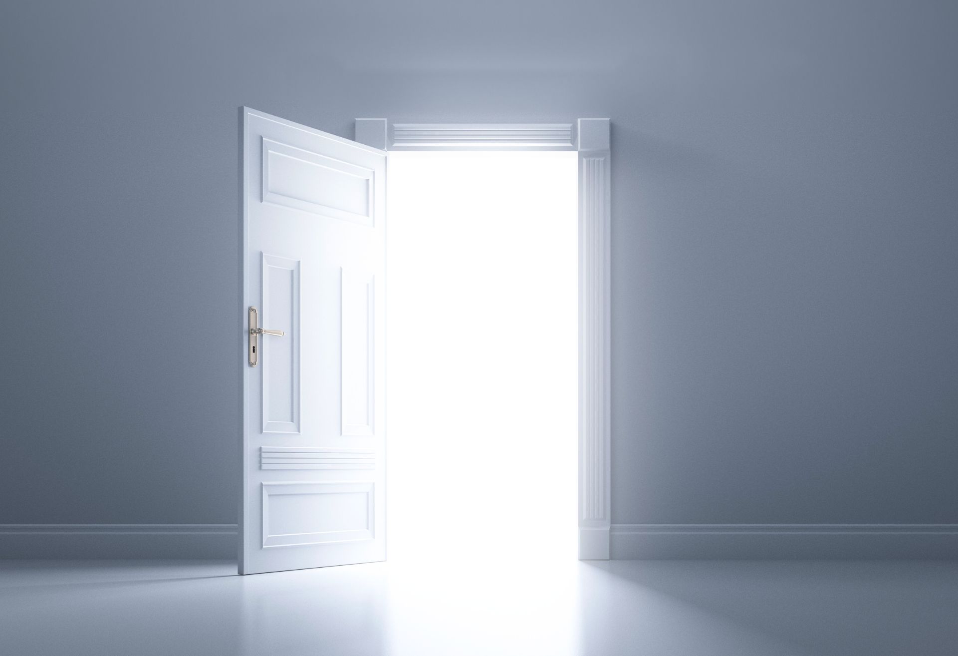 An open door with light streaming through